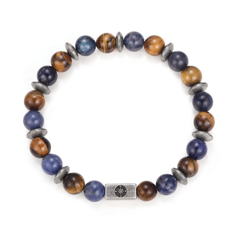 Armband Platja de Torà (Tiger-Sodalith-Steel mit Edelstahl-Kompass-Bead)